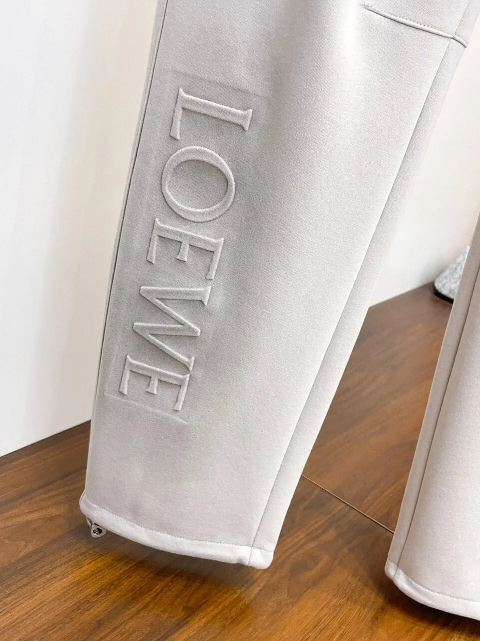 Dual‑Embossed Logo Relaxed Fit Pants