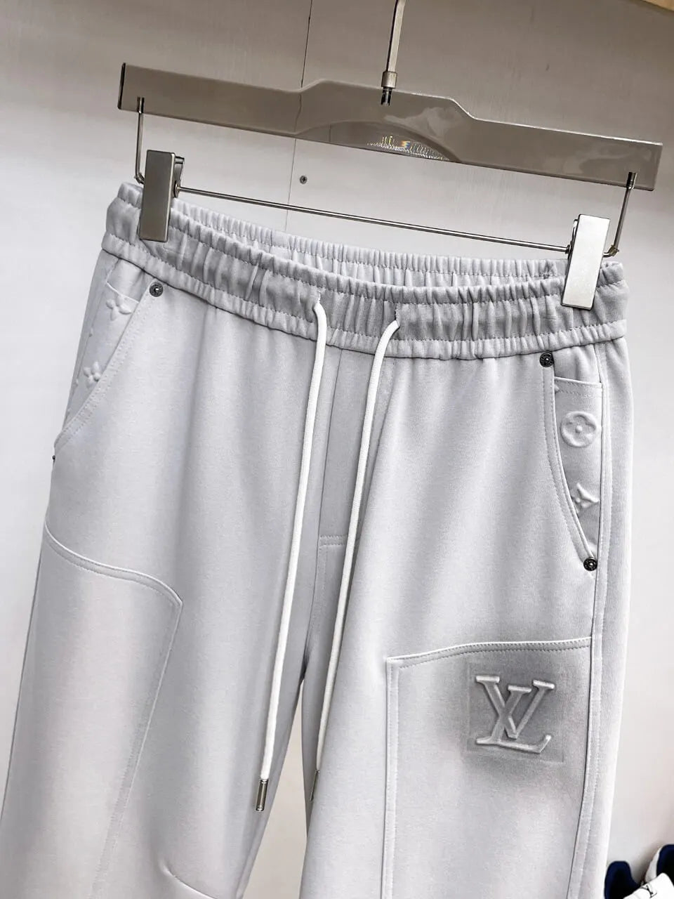 Debossed Logo Seam Stitching Pants