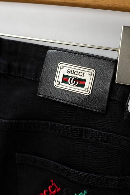 Red‑Green Letter‑Embroidered Jeans