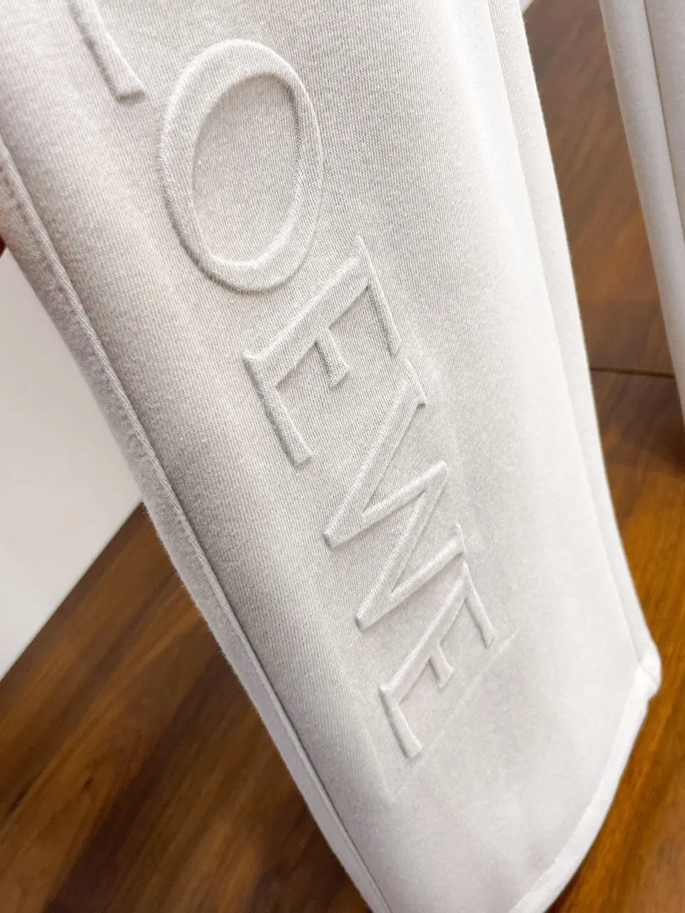 Dual‑Embossed Logo Relaxed Fit Pants